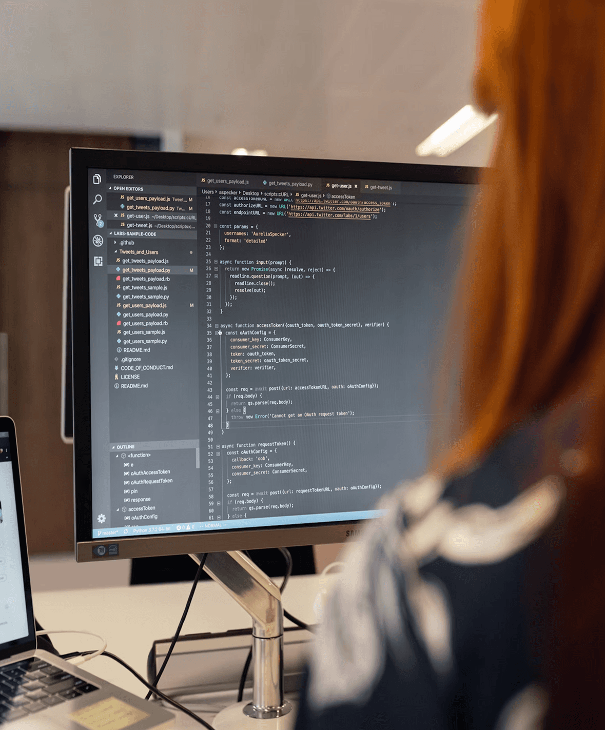Developer reviewing code on a screen