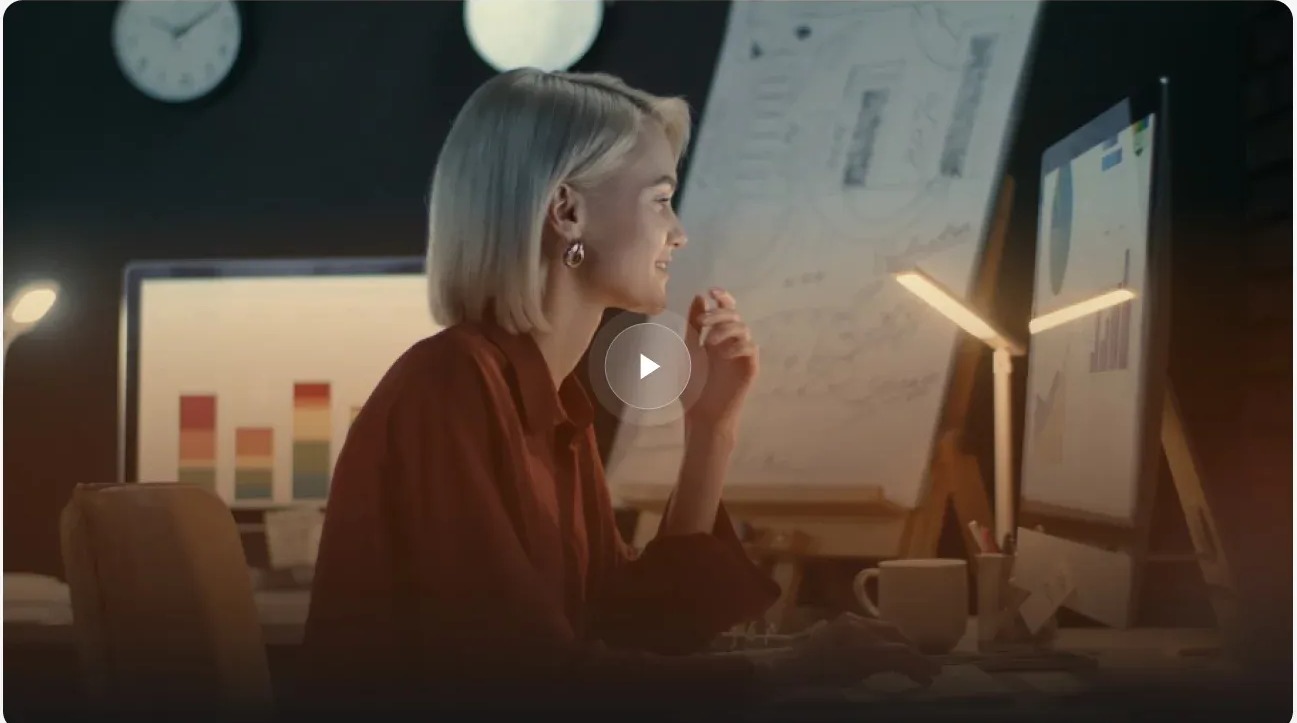 Designer reviewing work at a studio desk